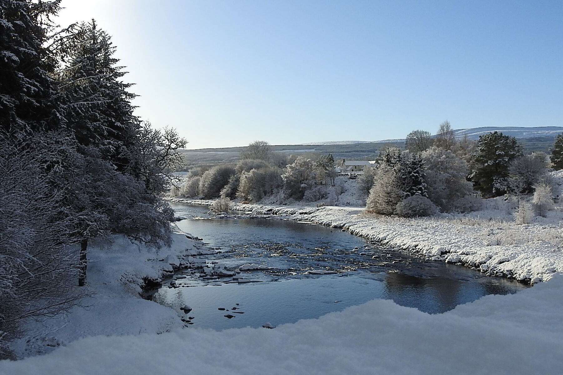 Rosehall image: frozen river with snow covering its banks