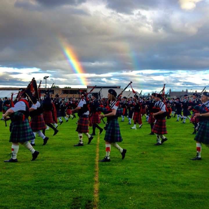 Tradtional Scottish pipe band playing at Golspie Gala, East Sutherland, North Highlands
