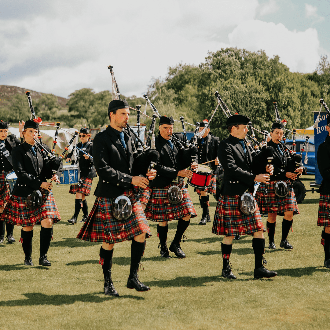 Traditional Scottish pipe band playing at Rogart Gala, Central Sutherland, North Highlands