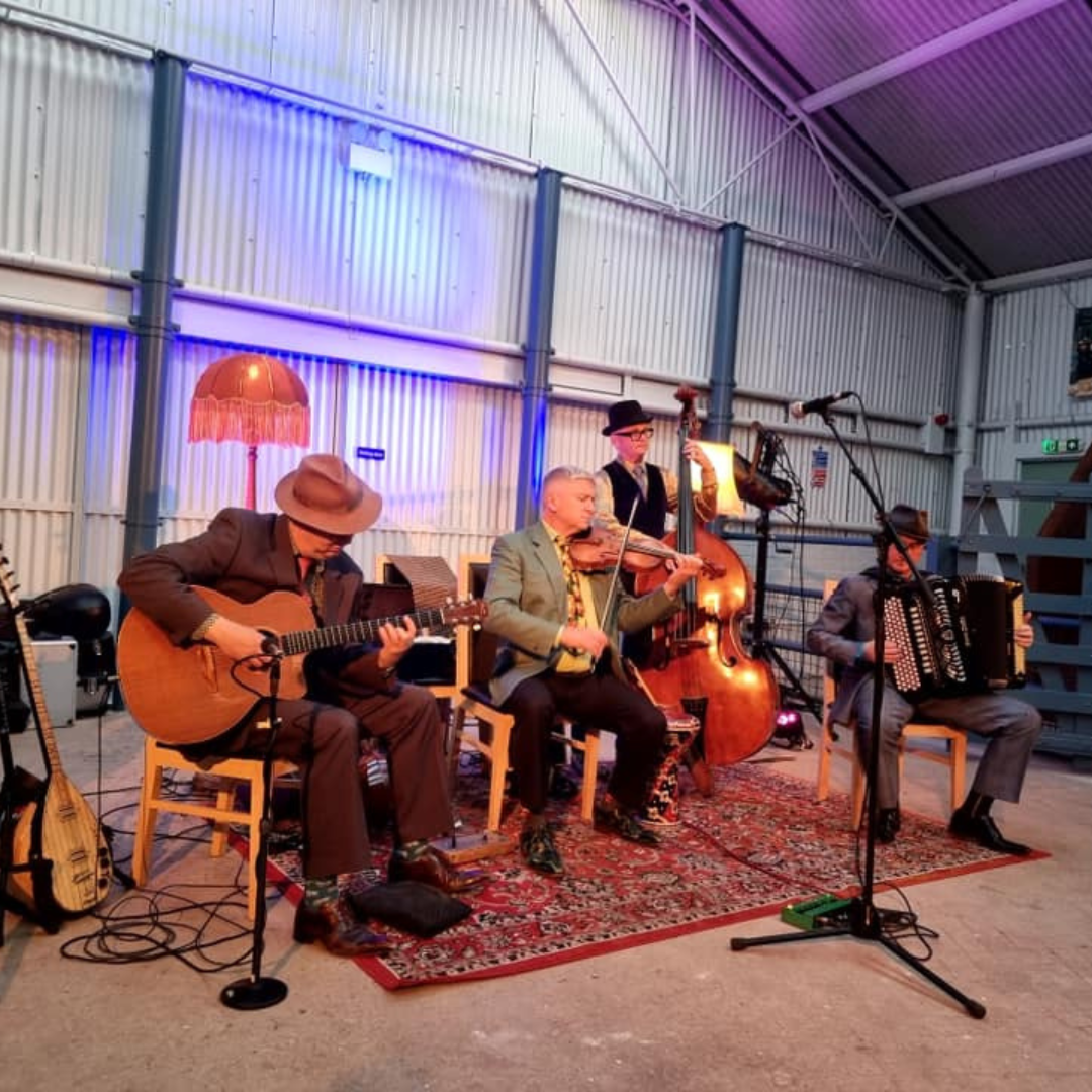 Scottish folk band play at a local concert at Rogart Mart, Central Sutherland, North Highlands