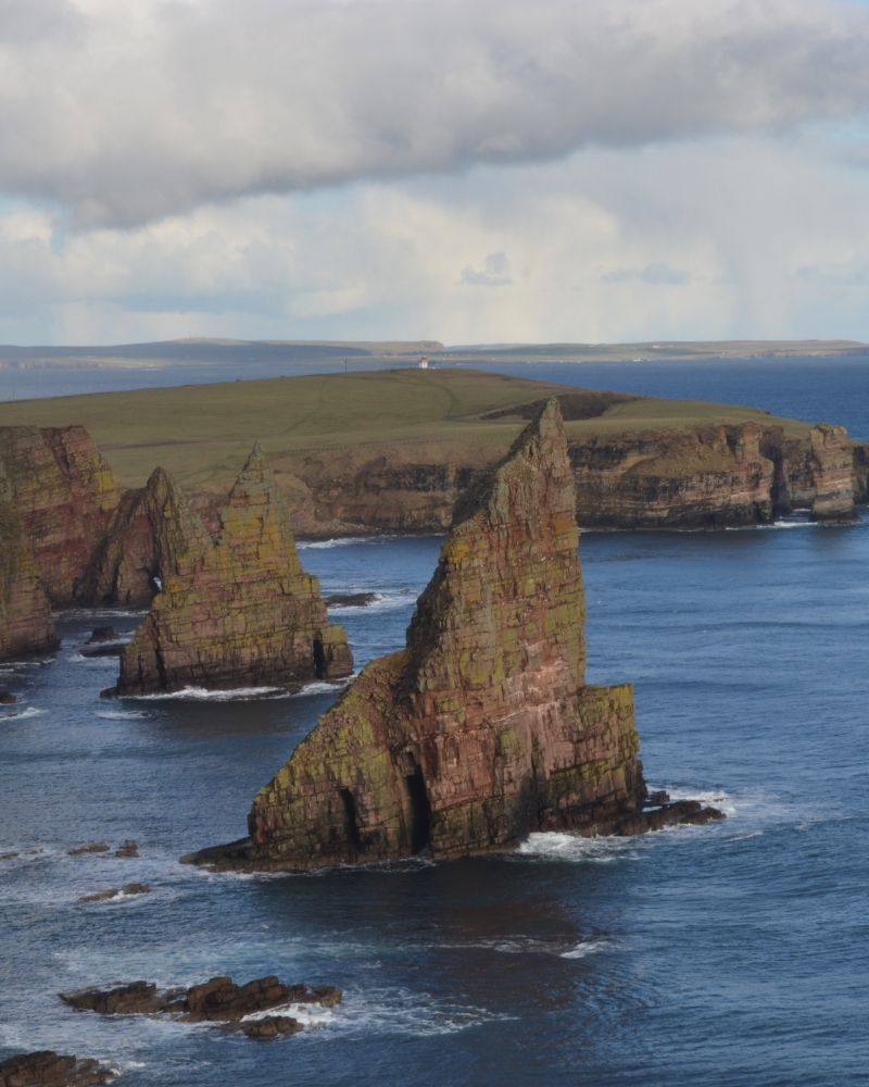 Duncansby Stacks, viewed from the cliff edge, in Caithness, Scotland. Attractions and landmarks.