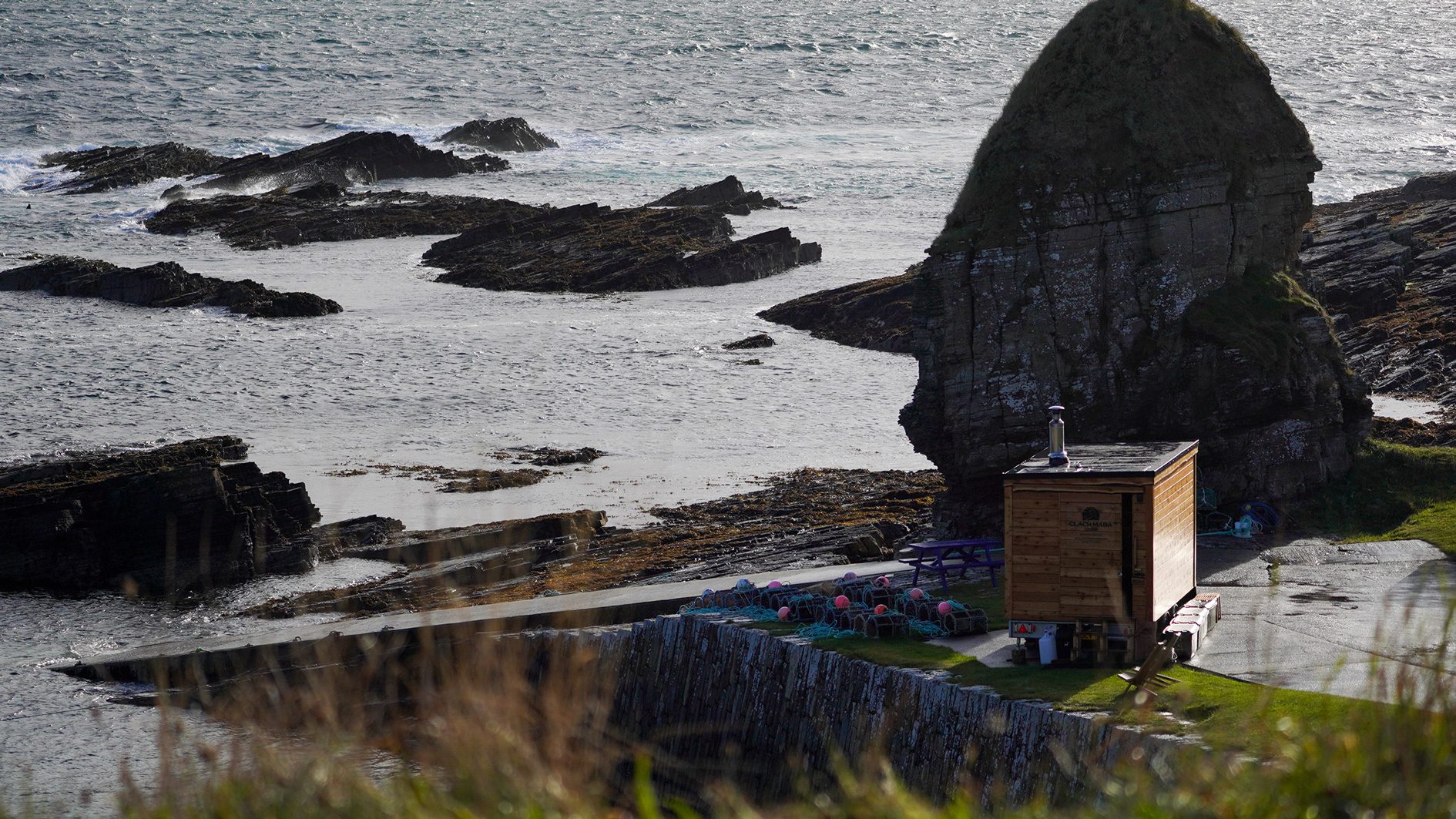 Clach Mara Sauna's travel suana viewed from a distance at Staxigoe Harbour, in Caithness, Scotland