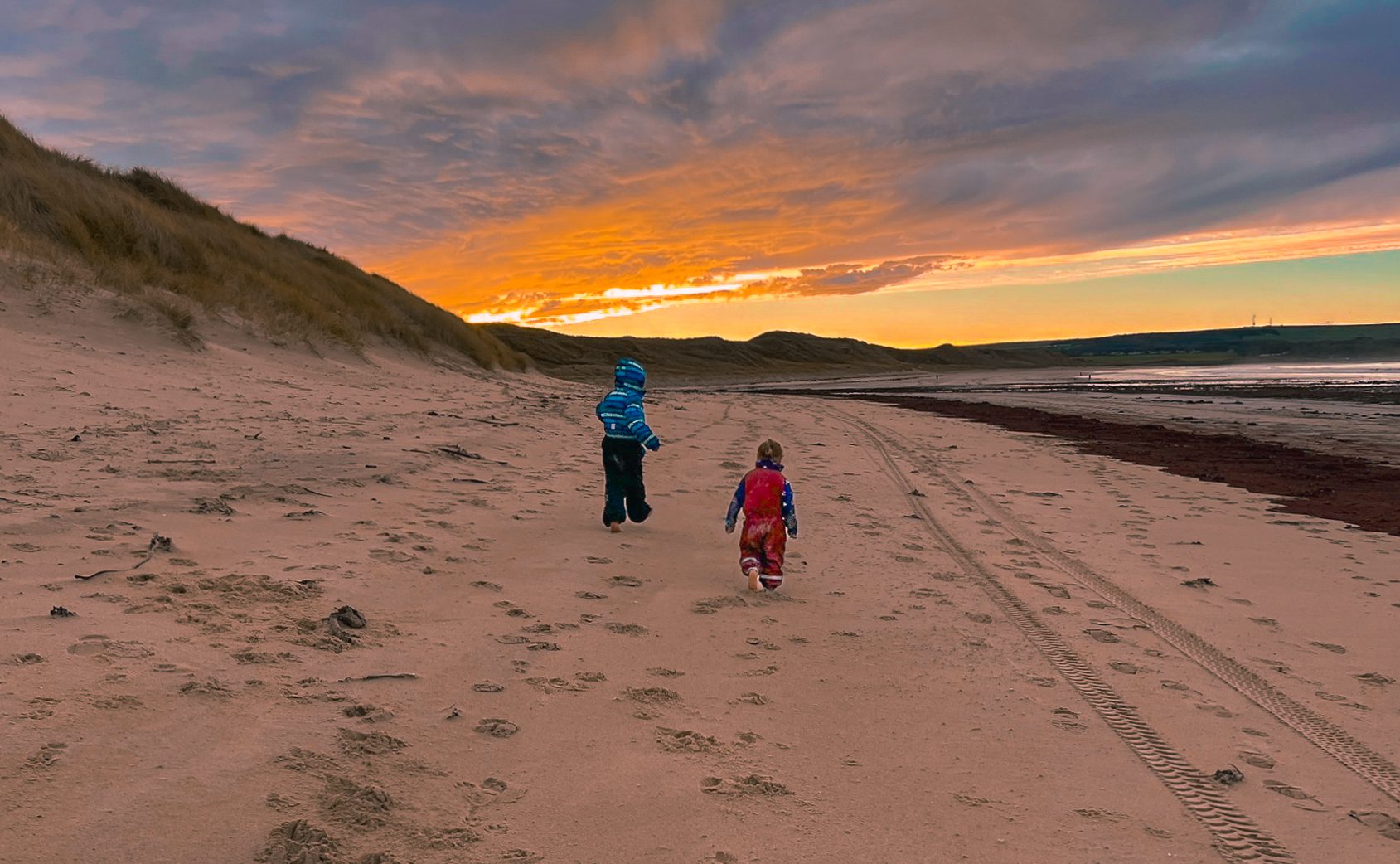 Family friendly holiday to Caithness, NC500, North Highlands. Family on Dunnett Beach