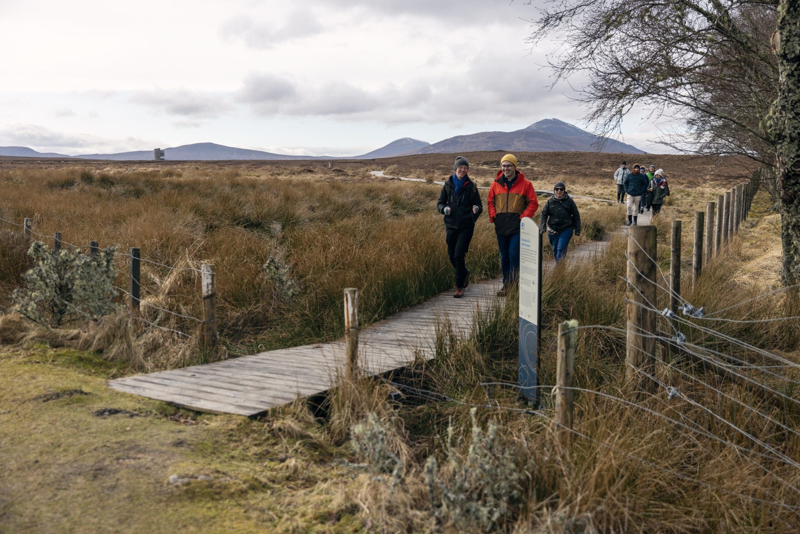 Walking along a bridge at Forsinard, Sutherland, North Highlands. Walking in the North Highlands
