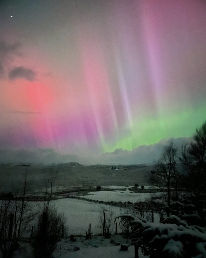 Nature’s magical light shimmering above the Highlands. Photo by Highland Luxury Cottages.