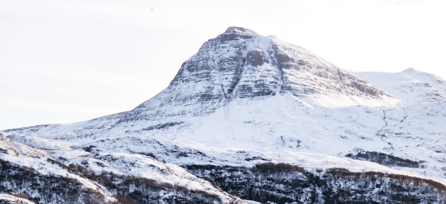 A tall snowy mountains in the North Highlands on the west coast.