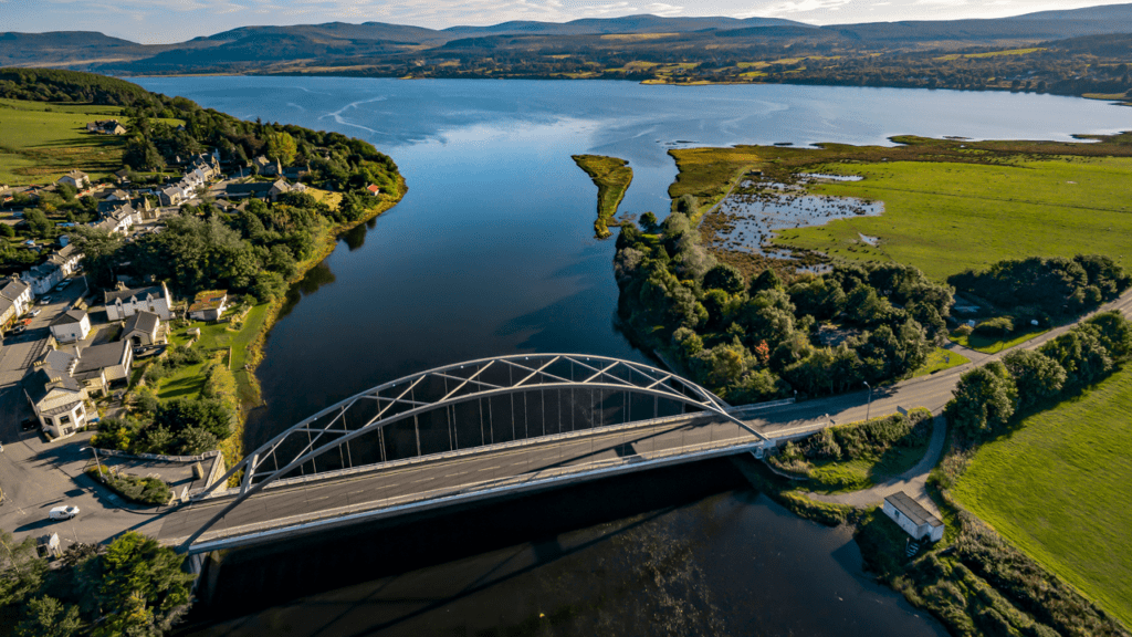 An aerial view of Bonar Bridge with the river opening into the Dornoch Firth, Sutherland, North Highlands