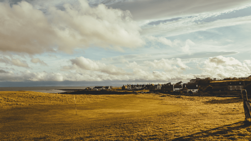 The golf course in Brora, the sea is visible in the background, in Brora, Sutherland, North Highland