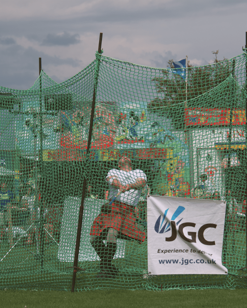 A man performing the hammer toss at the Halkirk Games, Caithness, North Highlands