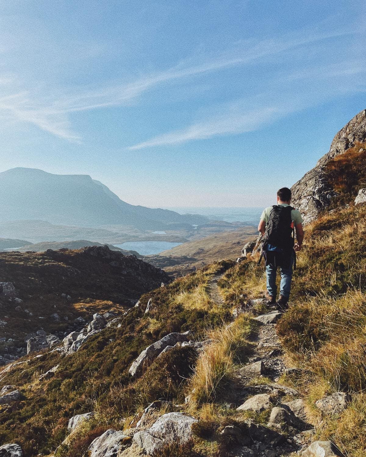 A hill walker in the North West Highlands, walking to Eas á Chual Aluin, Britains Highest Waterfall