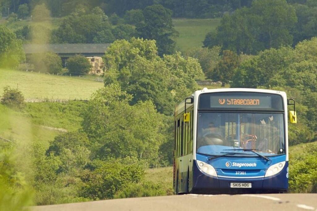 Stachcoach bus travelling through th North Highlands offering reliable public transport