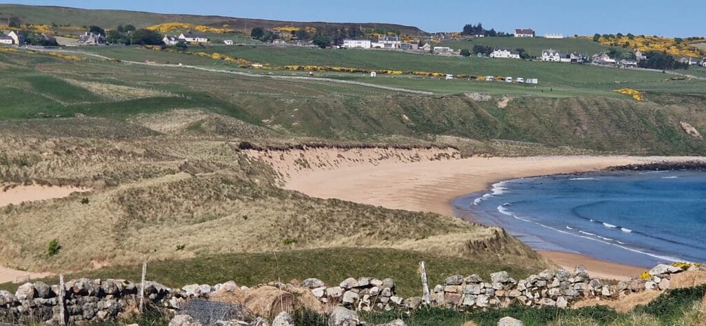 View from the beach looking up to Melvich Bay Caravan Park, in the North Highlands